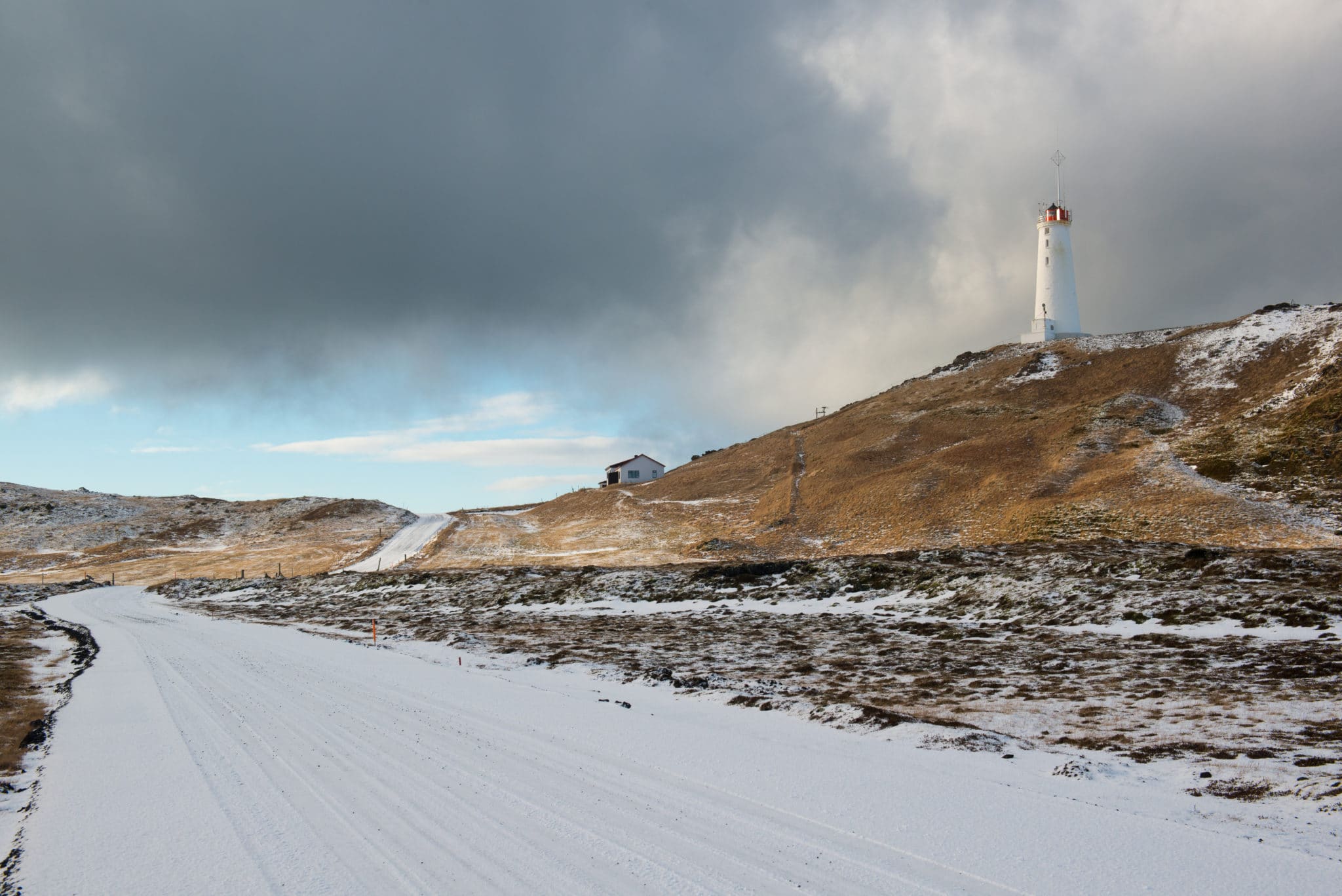 Lighthouse near geothermal area Gunnuhver at winter, Reykjanes Peninsula, Iceland